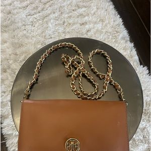 Super cute Tory Burch brown cross body bag!! Just like new